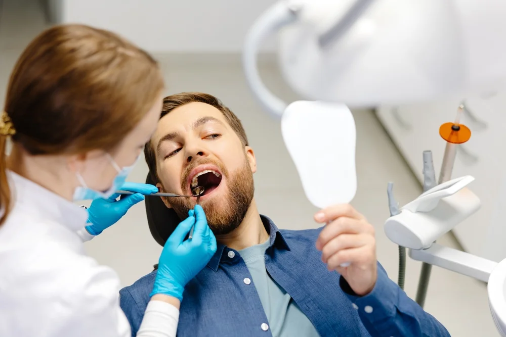 implant dentist vs general dentist tewksbury ma